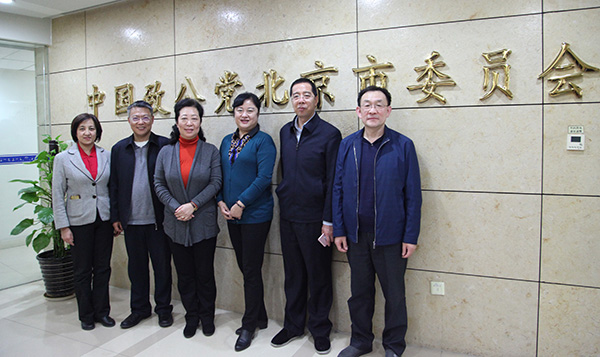 2019年2月25日，闫傲霜与朝阳区委统战部部长座谈-合影.jpg